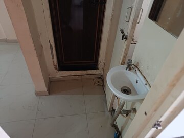 Bathroom in 1 BHK Builder Floor at Somwar Peth – for Rent