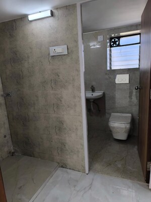 Bathroom in 3 BHK Apartment at Mangal Kripa CHS, Santacruz West – for Rent