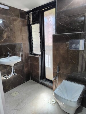Bathroom in 3 BHK Apartment at Mangal Kripa CHS, Santacruz West – for Rent