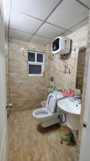 Bathroom in 3.5 BHK Apartment at Shree Vardhman Victoria, Sector 70 – for Rent