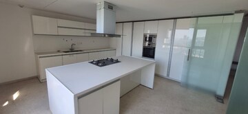 Kitchen in 4 BHK Apartment at Panchshil One North, Magarpatta City – for Sale