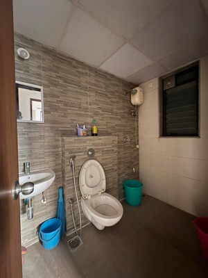 Master Bedroom in 1.5 BHK Apartment at Lodha Lakeshore Greens, Dombivli East – for Sale