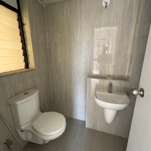 Bathroom in 1 BHK Apartment at Runwal Gardens Phase 2, Kalyan Shilphata Road – for Sale