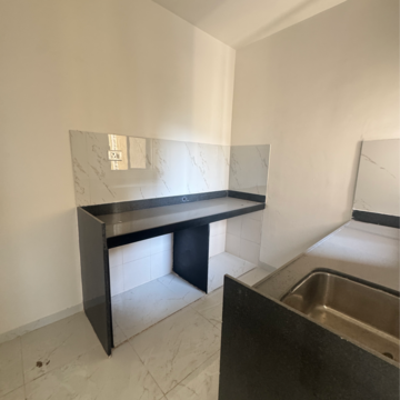 Kitchen in 1 BHK Apartment at Runwal Gardens Phase 2, Kalyan Shilphata Road – for Sale