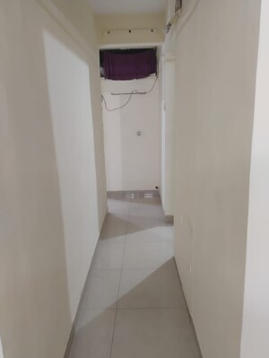 Building Lobby in 2 BHK Apartment at Vijaynagar Society, Marol – for Rent