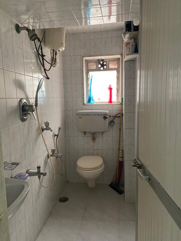 Bathroom in 2 BHK Apartment at Vijaynagar Society, Marol – for Rent