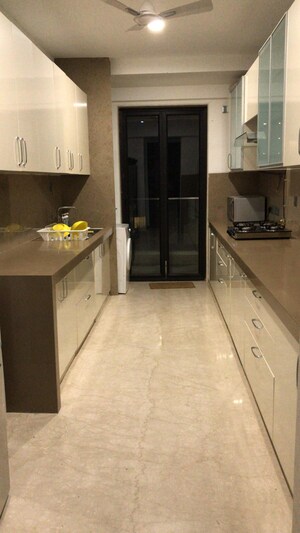 Kitchen in 4 BHK Apartment at Rustomjee Oriana, Bandra East – for Rent