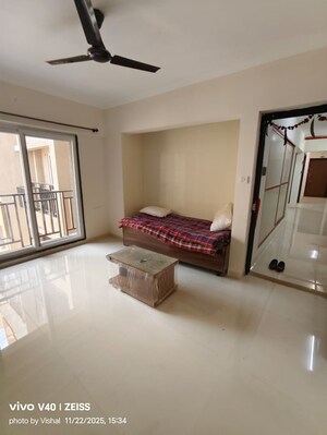 Living Room in 1 BHK Apartment at Raunak Bliss, Ghodbunder Road – for Rent