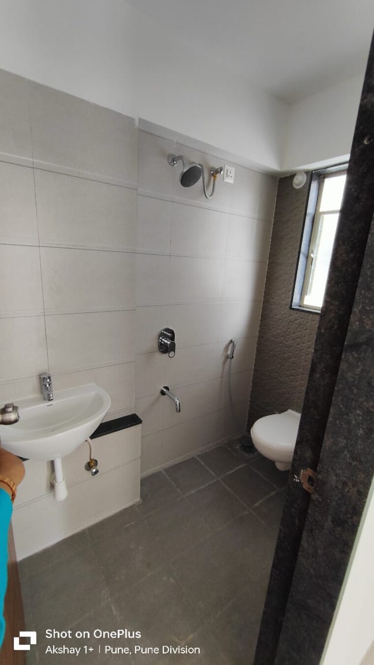 Bathroom, akshay-yash-grecia 3 Bedroom 806 Sq.Ft. Apartment In Dhanori Pune 9592915