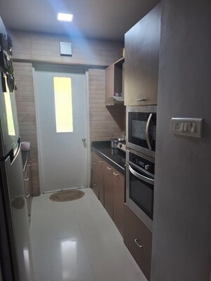 Kitchen in 3 BHK Apartment at Siddhachal Apartment 8, Vasant Vihar – for Rent