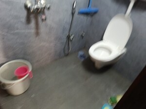 Bathroom in 3 BHK Apartment at Omkar Alta Monte, Malad East – for Rent