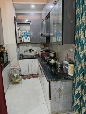 Kitchen in 4 BHK Builder Floor at Panchsheel Enclave – for Sale