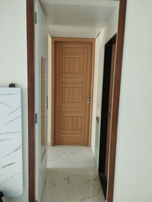 Building Lobby in 2 BHK Apartment at Aims Golf City, Sector 75 – for Sale