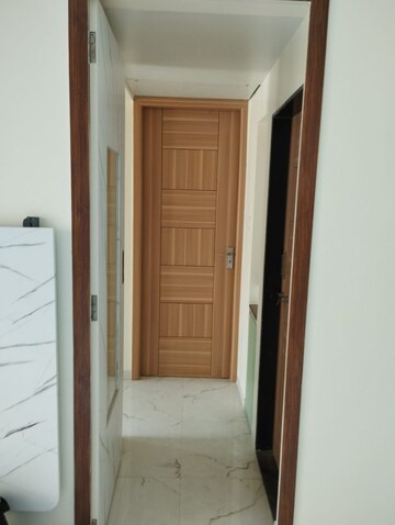 Building Lobby in 2 BHK Apartment at Aims Golf City, Sector 75 – for Sale