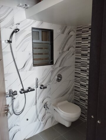 Bathroom in 2 BHK Apartment at Aims Golf City, Sector 75 – for Sale