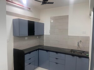 Kitchen in 2 BHK Apartment at Saarrthi Skybay, Mahalunge – for Sale