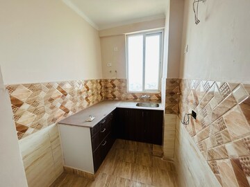 Kitchen in 2 BHK Apartment at Amrapali Dream Valley, Amrapali Dream Valley – for Sale