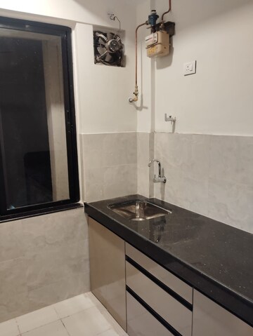Kitchen in 1 BHK Apartment at Hiranandani Gardens Cypress, Powai – for Rent