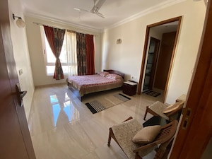 Living Room in 2 BHK Apartment at Jaypee Greens Pavilion Court, Sector 128 – for Rent