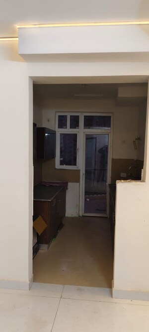 Kitchen in 3 BHK Apartment at Amrapali Heartbeat City, Sector 107 – for Rent