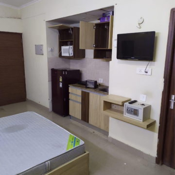 Kitchen in 1 RK Apartment at Supertech Ecociti, Sector 137 – for Rent