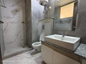 Bathroom in 4 BHK Builder Floor at Boutique Residential Apartments C-220, Malviya Nagar – for Sale