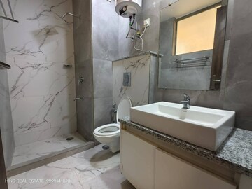Bathroom in 4 BHK Builder Floor at Boutique Residential Apartments C-220, Malviya Nagar – for Sale