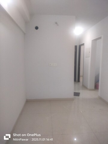 Living Room in 2 BHK Apartment at Lodha Palava Downtown, Dombivli East – for Rent