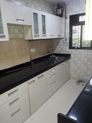 Kitchen in 2.5 BHK Apartment at Oberoi Realty Woods, Goregaon East – for Sale