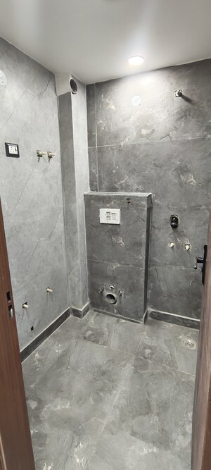 Bathroom in 3 BHK Builder Floor at Dwarka Mor – for Sale