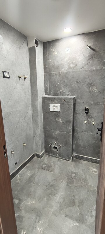 Bathroom in 3 BHK Builder Floor at Dwarka Mor – for Sale