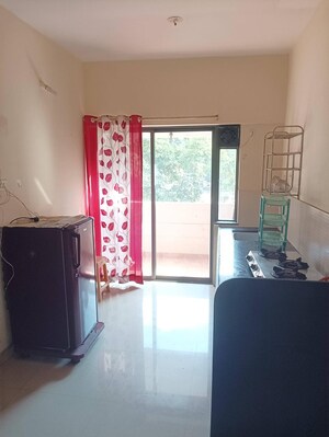 Kitchen in 2 BHK Apartment at Kumar Pebble Park, Hadapsar – for Rent