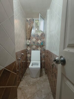 Bathroom in 1 BHK Apartment at Atlanta CHS, Malad West – for Rent