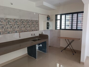 Kitchen in 2 BHK Apartment at Magarpatta Riverview City, Loni Kalbhor – for Rent
