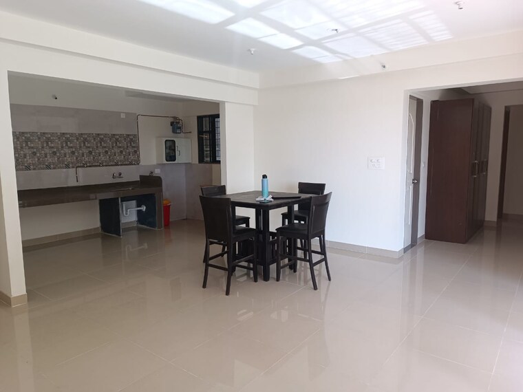 Living Room, magarpatta-riverview-city 2 Bedroom 904 Sq.Ft. Apartment In Loni Kalbhor Pune 9595451