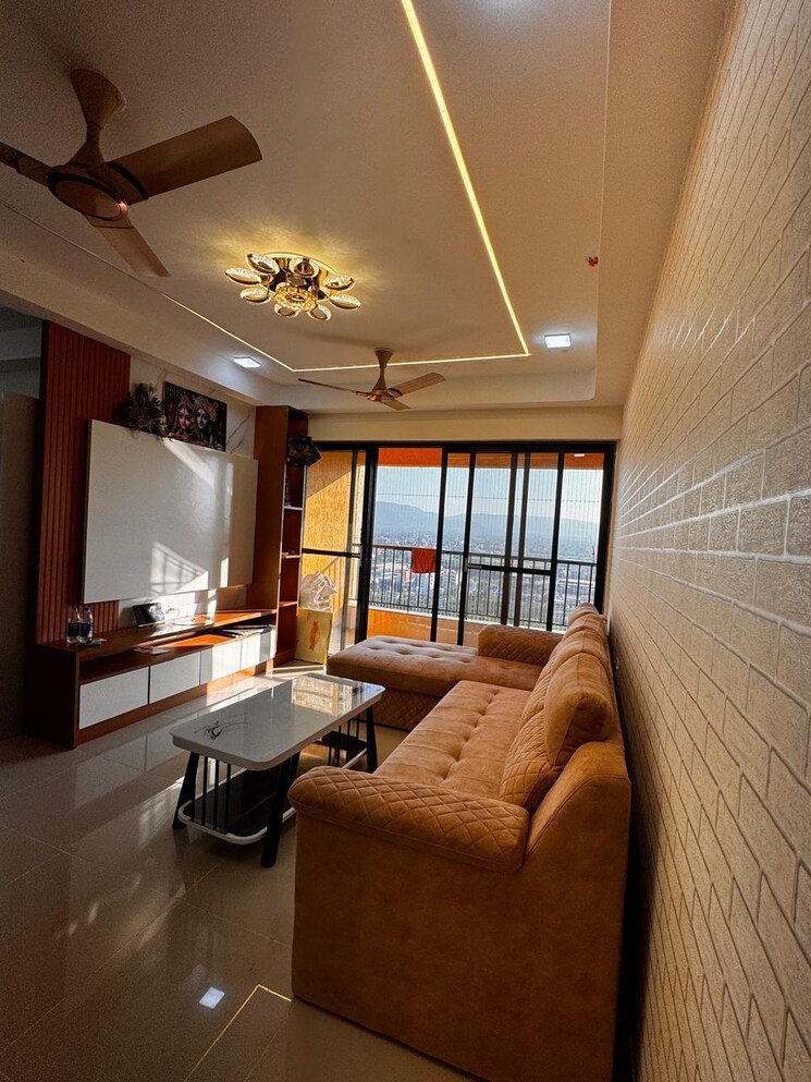 Living Room, magarpatta-riverview-city 3 Bedroom 1071 Sq.Ft. Apartment In Loni Kalbhor Pune 9595509