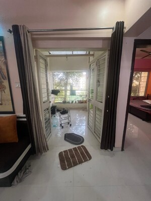 Living Room in 2 BHK Apartment at GK Dwarka Sai, Rahatani – for Rent