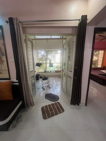 Living Room in 2 BHK Apartment at GK Dwarka Sai, Rahatani – for Rent