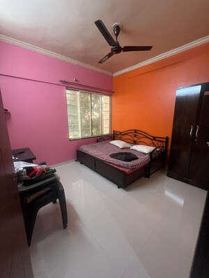 Bedroom in 2 BHK Apartment at GK Dwarka Sai, Rahatani – for Rent