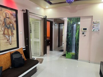 Living Room in 2 BHK Apartment at GK Dwarka Sai, Rahatani – for Rent