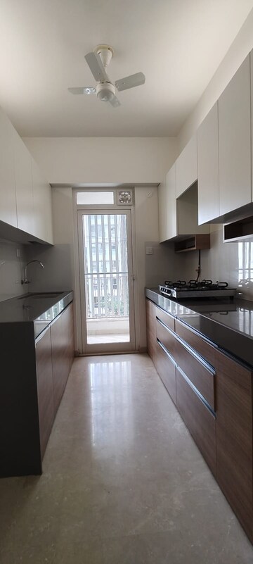 Kitchen in 1 BHK Apartment at Godrej The Trees Phase II, Vikhroli East – for Rent