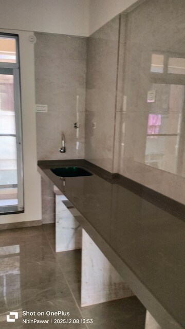 Kitchen in 3 BHK Apartment at Shubhada CHS, Dombivli West – for Sale