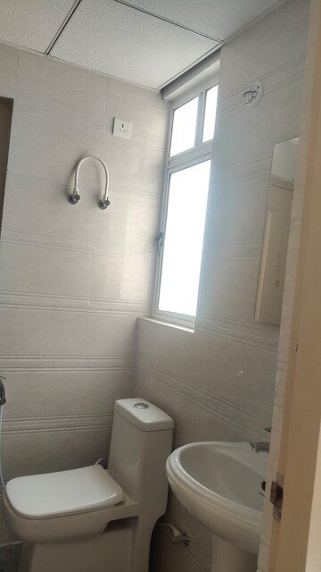 Bathroom in 3 BHK Apartment at Oro Element, Jankipuram Extension – for Rent