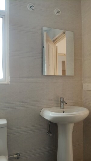 Bathroom in 3 BHK Apartment at Oro Element, Jankipuram Extension – for Rent