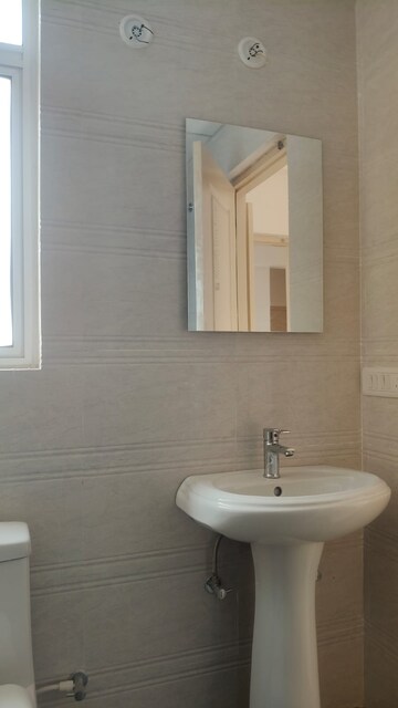 Bathroom in 3 BHK Apartment at Oro Element, Jankipuram Extension – for Rent