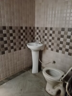Bathroom in 1.5 BHK Builder Floor at Ansals Sushant City – for Rent