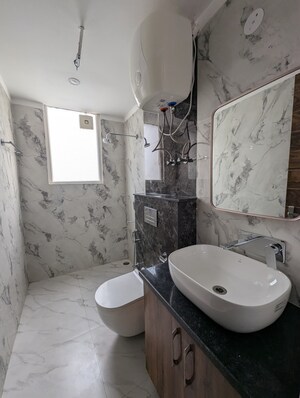 Bathroom in 4 BHK Builder Floor at Kohli One Malibu Town, Sector 47 – for Sale