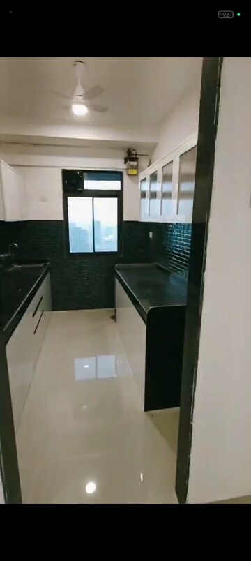 Kitchen in 2 BHK Apartment at Dev Leo Tower, Oshiwara – for Rent