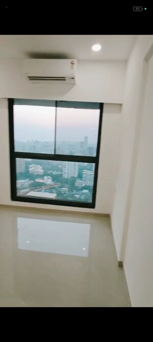 Room in 2 BHK Apartment at Dev Leo Tower, Oshiwara – for Rent