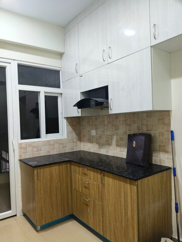 Kitchen in 4 BHK Apartment at Amrapali Crystal Homes, Sector 76 – for Rent